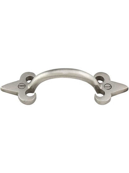 Arched Handle Bronze Fleur-de-Lis 4-Inch Cabinet Pull in White Bronze.